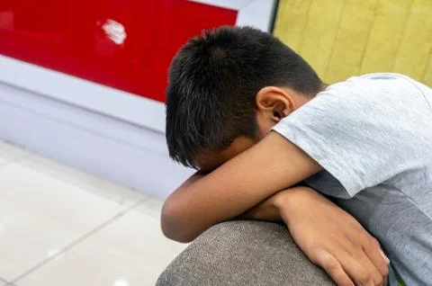 Boy Hiding Face Stock Photos