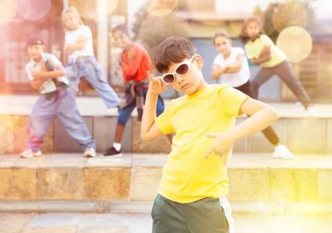 Boy hip hop dancer exercising outdoors Stock Photos