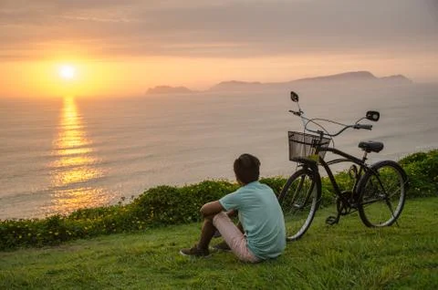 Boy with his bicycle Stock Photos