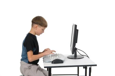 Boy on His Computer Stock Photos