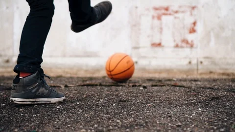 The boy hits the ball with force and the ball flies and hits the Board Stock Footage 125856097