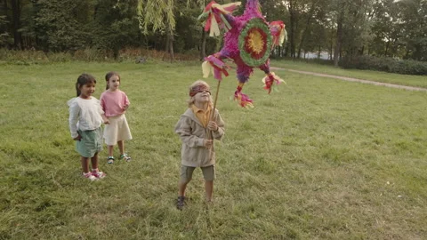 Kid Pinata Stock Video Footage | Royalty Free Kid Pinata Videos | Pond5