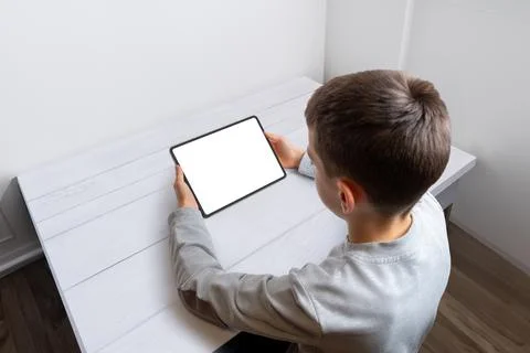 Boy hold tablet with isolated screen for game or app promotion Stock Photos