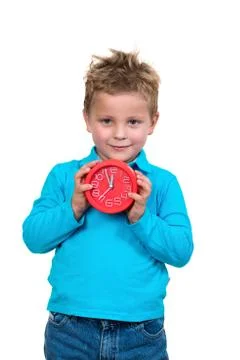 Boy is holding big clock, isolated over white Stock Photos