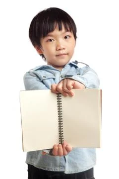 Boy holding blank notebook Stock Photos