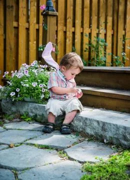 Boy Holding a Broken Egg Stock Photos