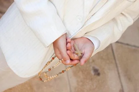 Boy holding cross Stock Photos