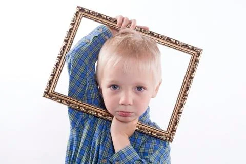 Boy holding frame Stock Photos