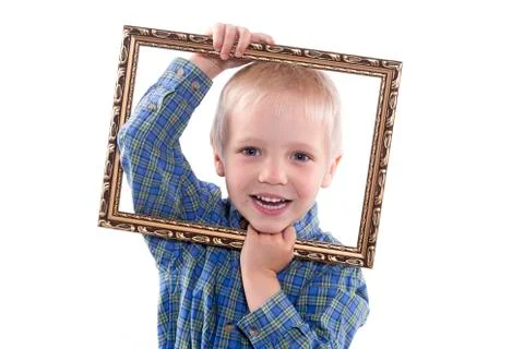 Boy holding frame Stock Photos