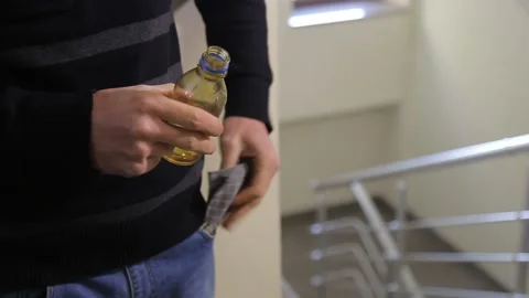The boy holding small bottle 2 Video stock 322058363