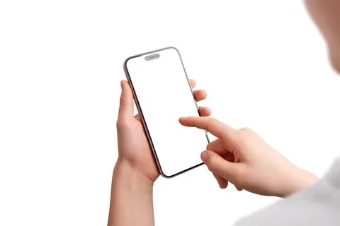 Boy holds a smartphone vertically, touching the screen with his right hand Stock Photos