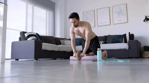 Boy at home doing aerobic exercise Stock Footage 130981401