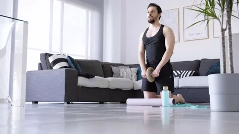 Boy at home doing aerobic exercise Stock Footage 130981460