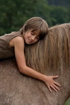Boy on horseback Stock Photos