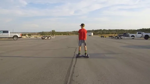 Boy on Hoverboard HD Stock Footage 97664992