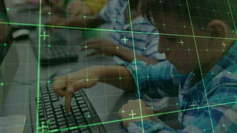 Boy hovering finger above key then pressing in lab, classmates typing under grid Stock Footage 312280433