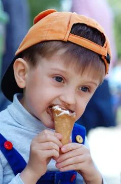 Boy with ice cream Stock Photos