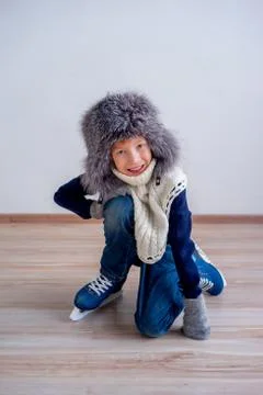 Boy in ice skates Stock Photos