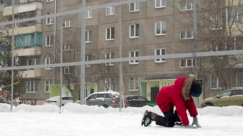 A boy is ice skating during a snowfall. Stock Footage 146708082