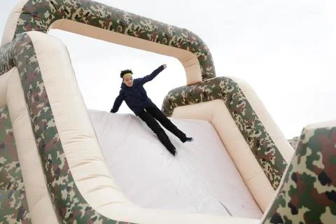 Boy in a inflatable toy Stock Photos