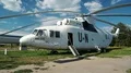 Boy inside cabin of old Soviet transport helicopter Mil Mi-26 for United Nations HD Footage
