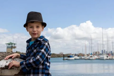 Boy on a Jetty Stock Photos