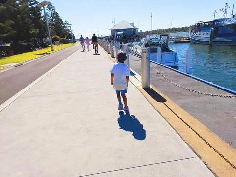 A boy at a jetty Foto stock