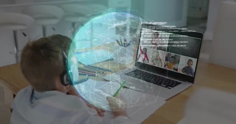 Boy joining class on laptop writing notes as translucent code globe appearing Stock Footage 317206849