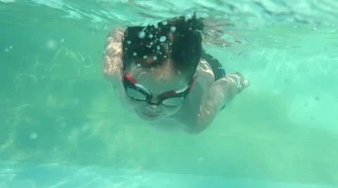 Boy jumping and diving in Swimming Pool. Kids. Slow Motion HD Stock Footage 48672702