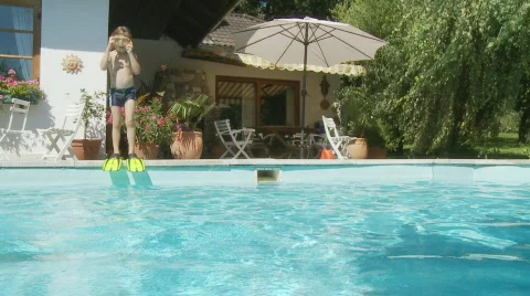 Boy jumping with fins Stock Footage 147401