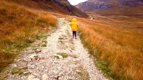 Boy Jumping on the hills Stock Footage 119414124