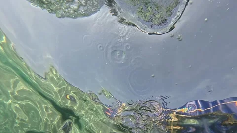 Boy jumping into the sea Stock Footage 243410614