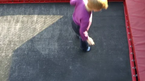 Boy jumping on trampoline Stock Footage 8957064
