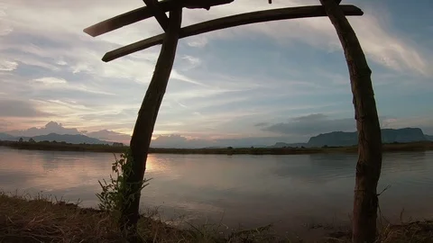 Boy jumping to water with sunset background Stock Footage 97433658