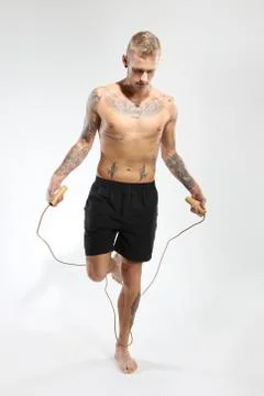 Boy jumps rope . Stock Photos