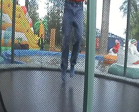 Boy jumps on trampoline Video stock 11361698