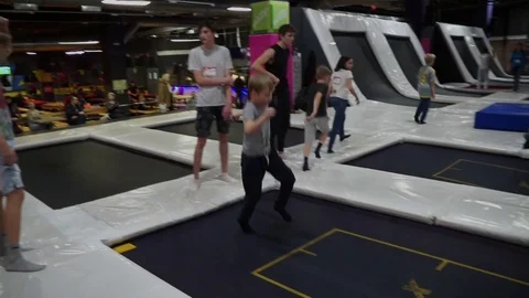 The boy jumps on a trampoline Stock-Footage 88146923