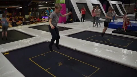 The boy jumps on a trampoline Stock Footage 88146939