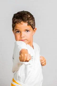 Boy karate punch Stock Photos