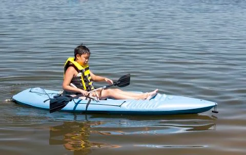 Boy in a kayak Stock Photos