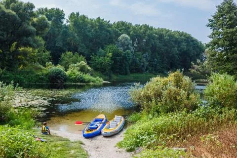 Boy kayaking on the river Foto stock