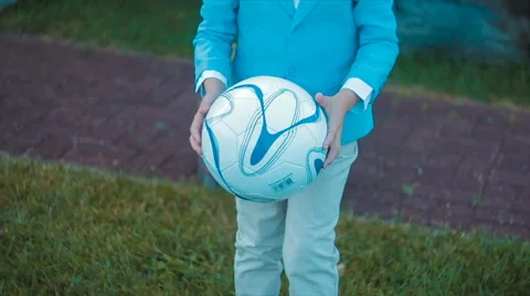 Boy Kicks a Soccer Ball Stock Footage 68791693