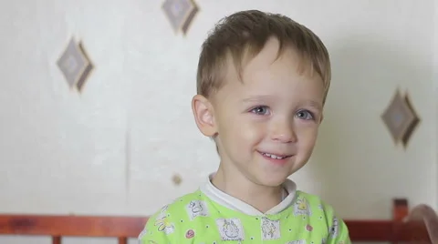 Boy Kid in a crib laughing Stock Footage 68580757