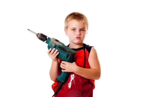 Boy kid with drill Stock Photos