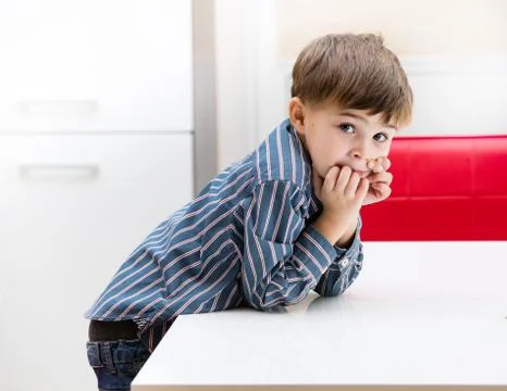 The boy in the kitchen Stock Photos