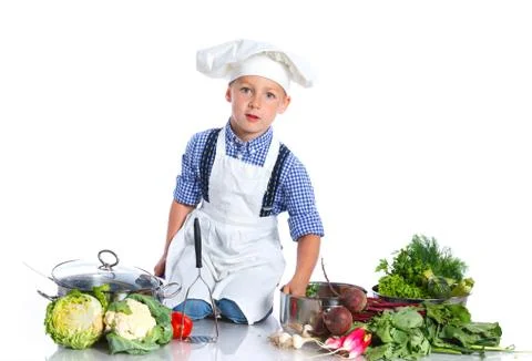 Boy kitchener in chef's hat 写真素材