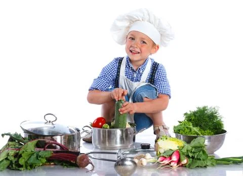 Boy kitchener in chef's hat 写真素材