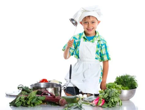 Boy kitchener in chef's hat Stock-Fotos
