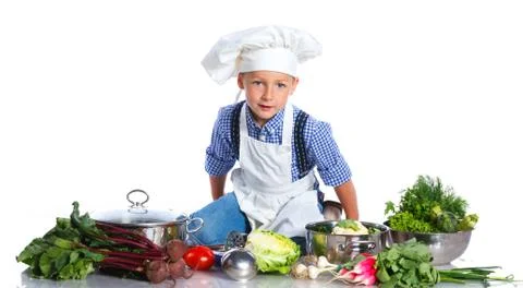 Boy kitchener in chef's hat 写真素材