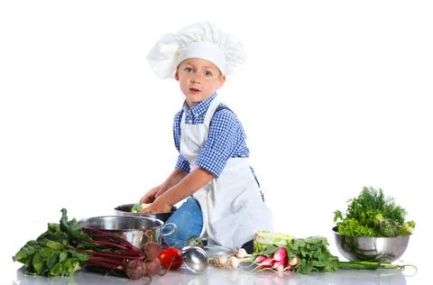Boy kitchener in chef's hat 写真素材